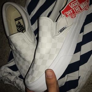 White on white checkered vans slip on